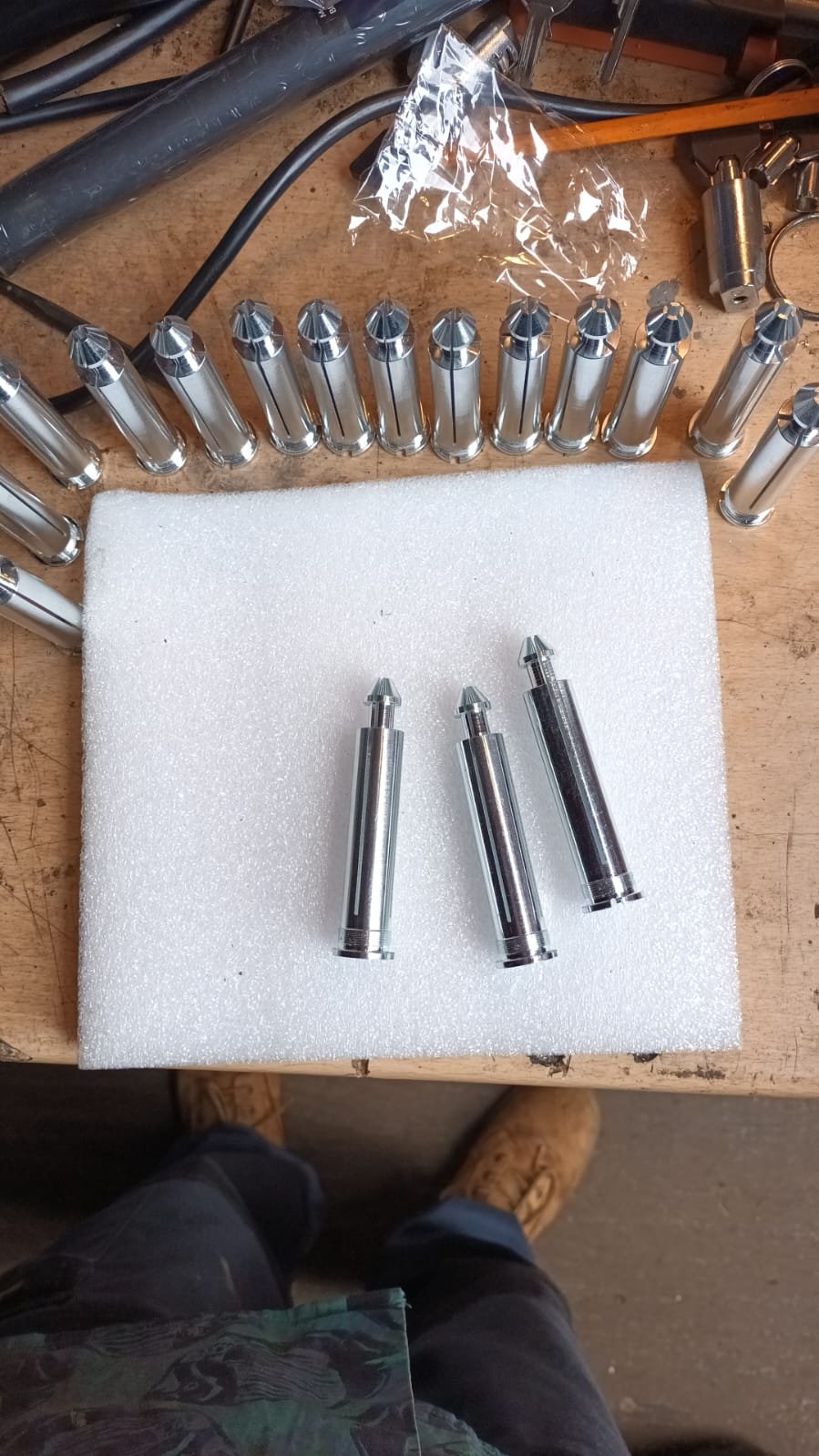 Expanding internal collet — forged from exotic metal